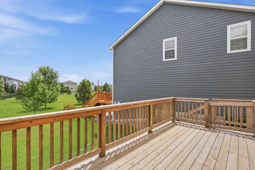 Spacious cedar deck extends your living space outdoors.
