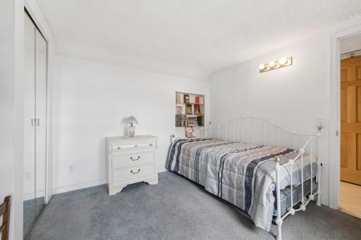 Main floor bedroom with extra closet space