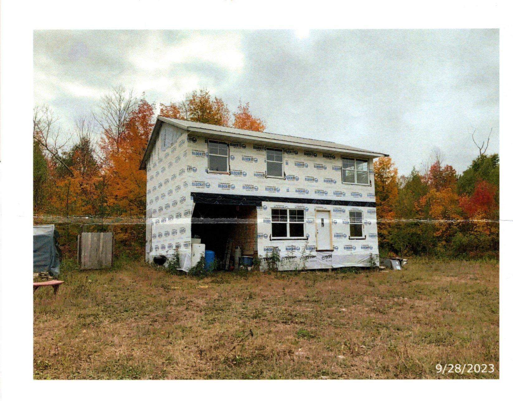 The rustic bunk house was constructed in approximately in 2023. The construction has concrete pylons and green treated posts for a sturdy construction.