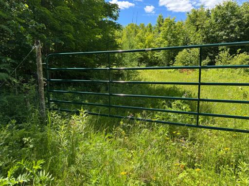Building site has a locked gated entrance.