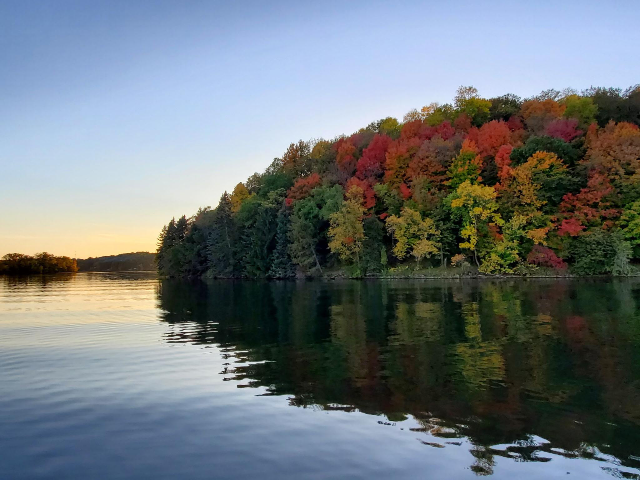 Autumn colors and calm waters