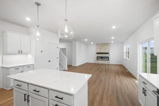 The center island overlooks the dining room and Great Room to promote seamless everyday living