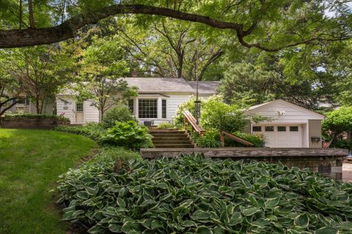 Extensively remodeled 1940 cozy home nestled on a .36 acre site on a quiet cul-de-sac 3 blocks from the heart of downtown Excelsior.