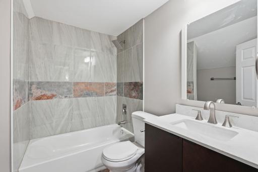 Completely remodeled upper level full bath.jpg