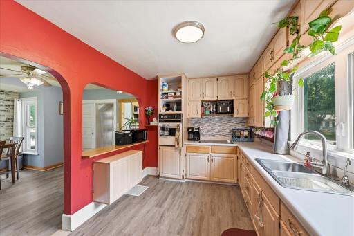 New flooring in the kitchen, dining room. Nuetral decor and breakfast area.