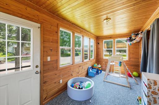 Front porch doubles as an entertainment area and is accessible from the living room.