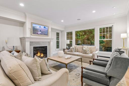 Custom enameled mill work, cased openings, excellent use of recessed lighting and high ceilings