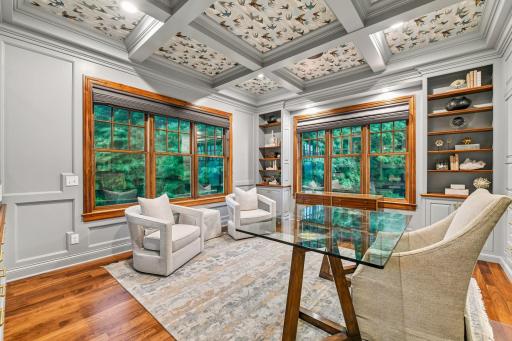 Main Floor office overlooking lush backyard