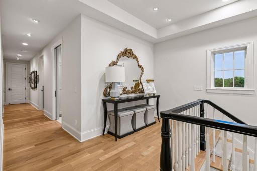 Open Foyer and stairway to upper level, all hardwood flooring, bright and light throughout upper level