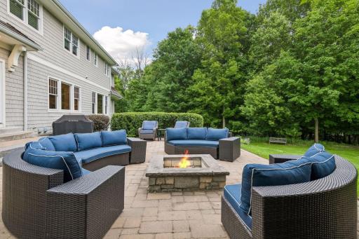 Huge backyard patio with firepit to unwind with friends...