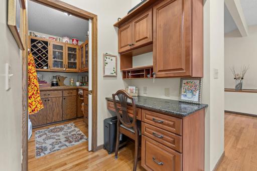 kitchen work station that leads into a butlers pantry