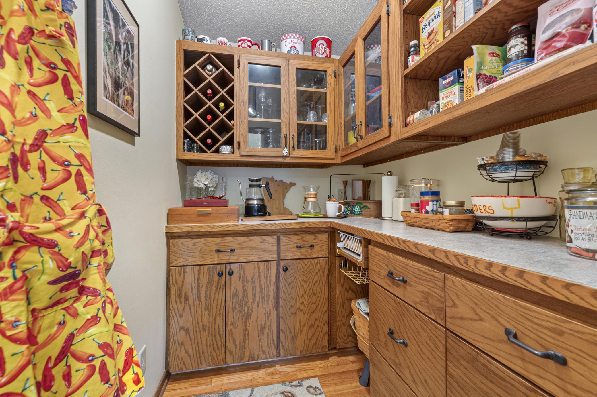 butlers pantry with plenty of storage