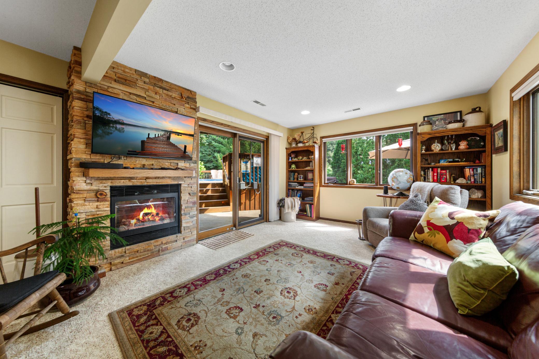 lower level living room with gas fireplace