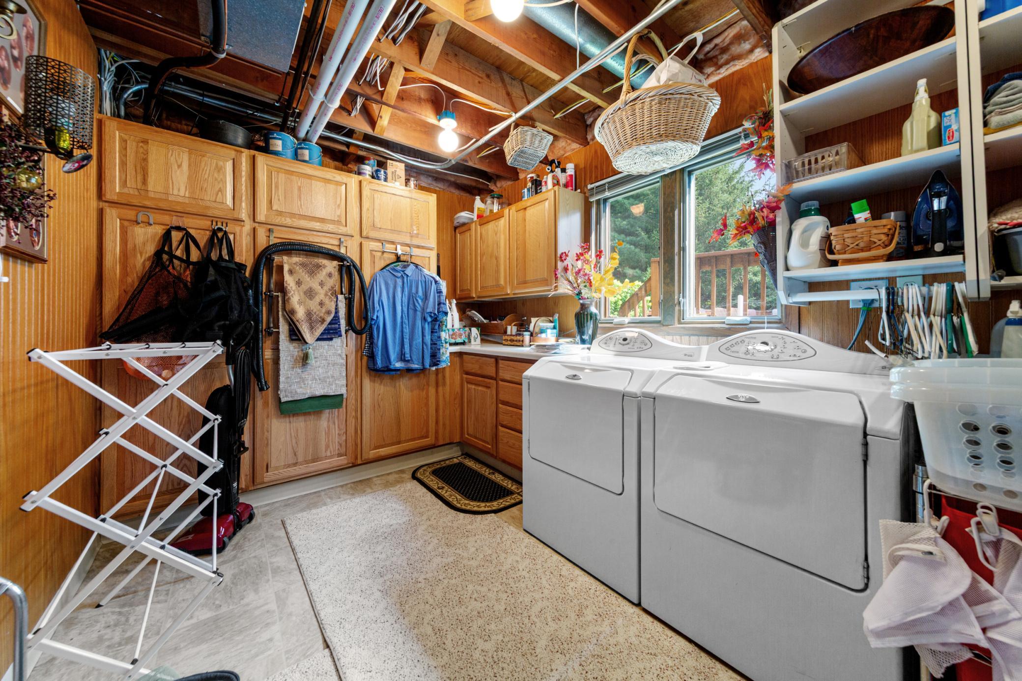 HUGE laundry room with extra storage