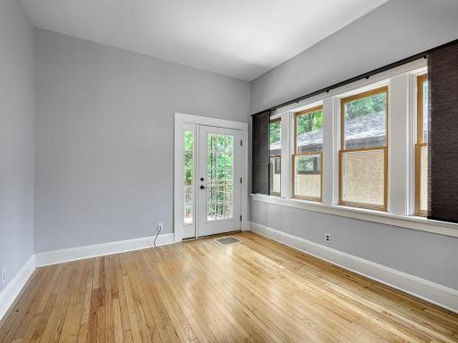 The first floor bonus room could be used as an office, den or sunroom. The french doors open to the back yard and deck