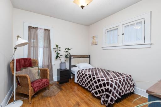 Bedroom 3 with more piano windows - perfect for added natural daylight while maintaining privacy.