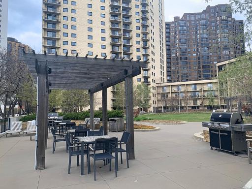 Plaza offers a generous green space above street level. Complementary gas grills are available.