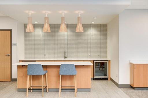Community room with kitchen off the main entry.