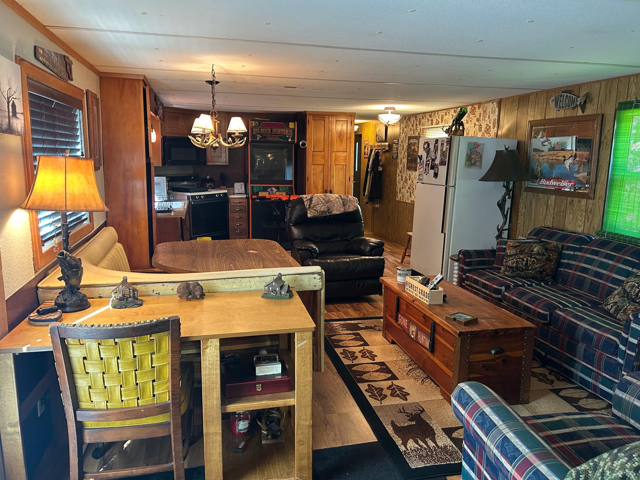 A look inside at the great room from the living room all the way across to the kitchen.
