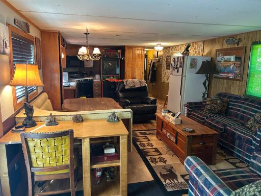 A look inside at the great room from the living room all the way across to the kitchen.
