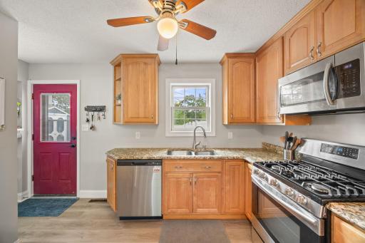 All Stainless Steel Appliances and gas range and beautiful granite counters