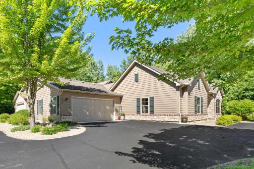 See Updates & Features Sheet in MLS Listing Documents. Welcome to this fully updated, turn-key patio townhome - the best available option in Rivers Edge, tucked away on a quiet, private wooded cul-de-sac enclave!