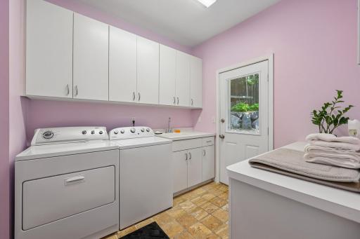 Main level laundry room off of kitchen