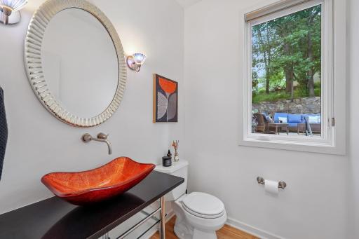 Main level bathroom off of kitchen