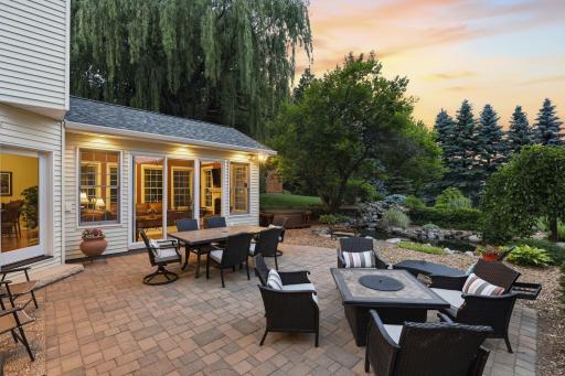 Just off the sun room is a beautiful paver patio that is ready for entertaining or just relaxing.