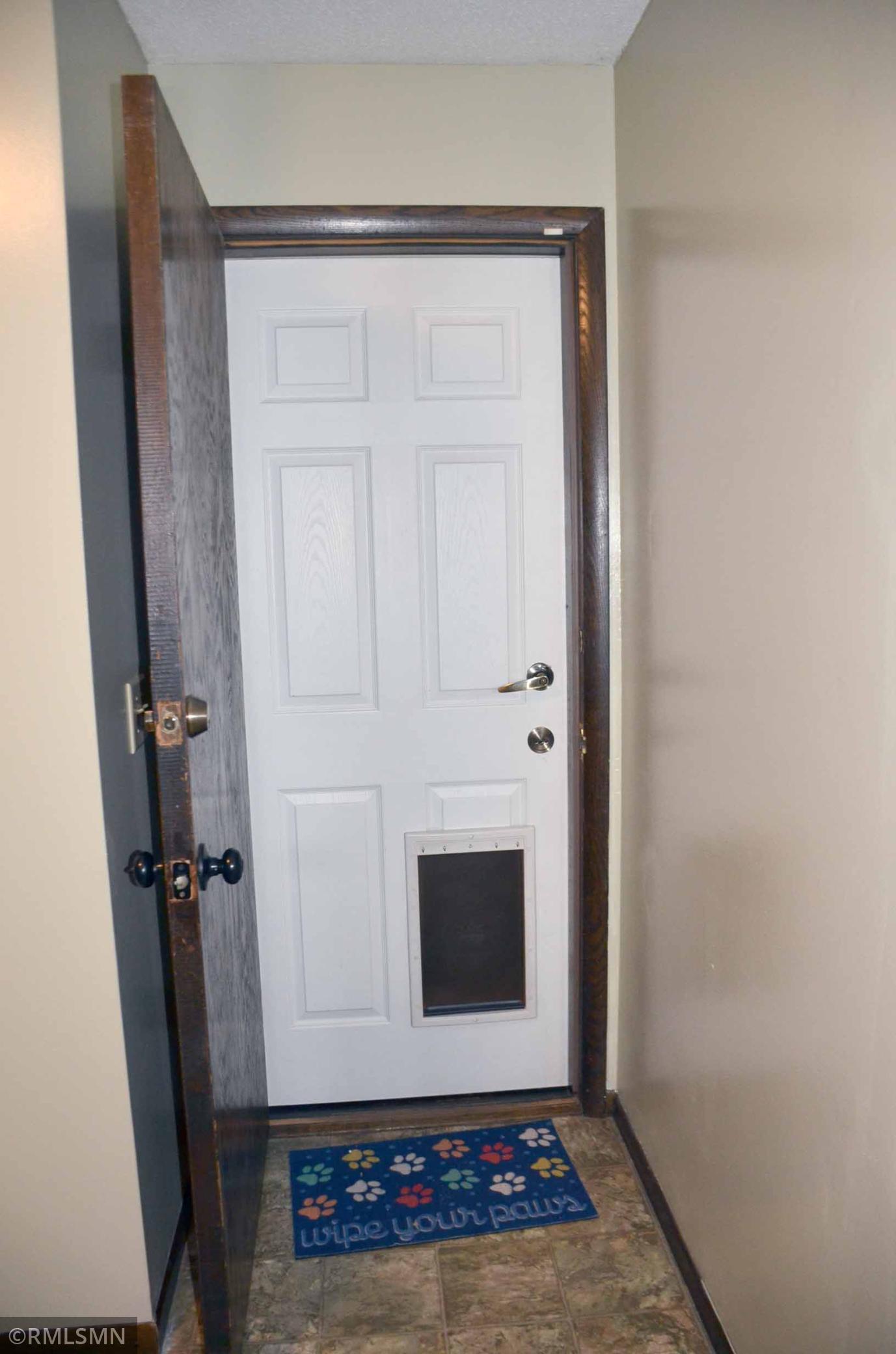 there is a 2nd door with a built in doggie door
