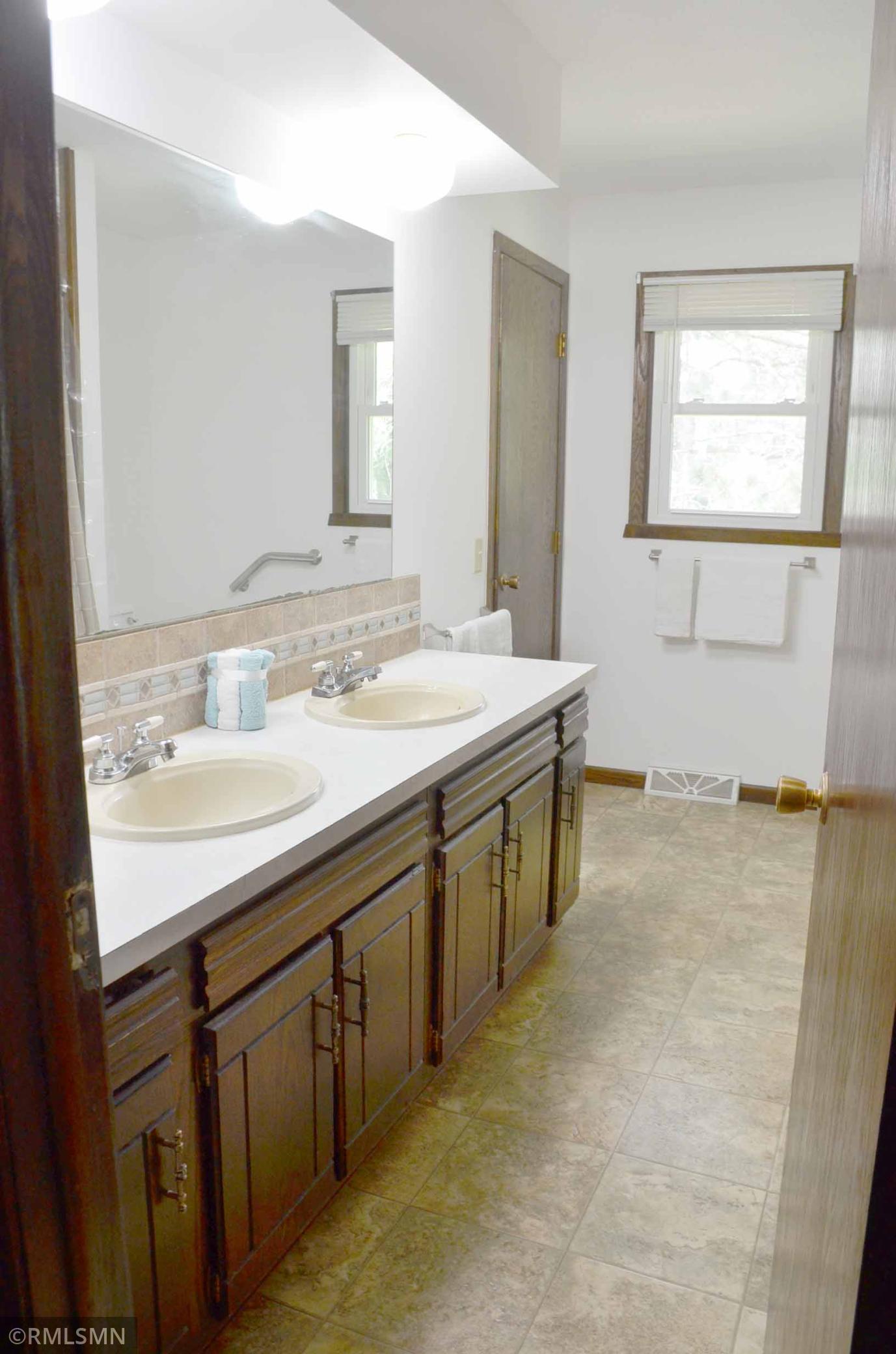 upper level jack and jill bathroom, with a double sink