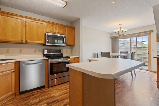 Kitchen with Stainless steel range, micro, and new dishwasher