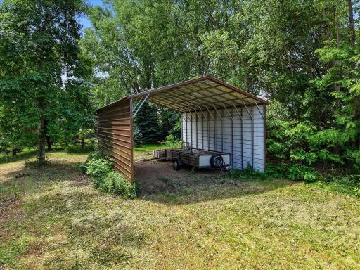 Carport building with lots of storage room (current trailers are NOT staying)