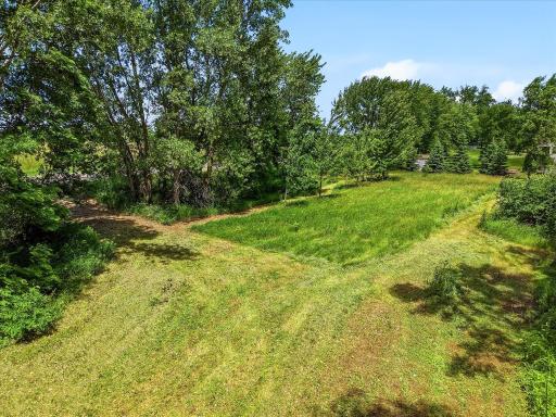 Level area near access to Rawlings. Aerial Straight over top of lot. Sewer, water, natural gas, electric and cable available on the lot