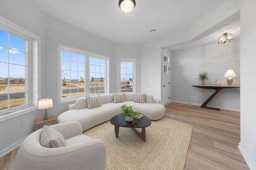 Representational Purpose Only. Distinctive bay windows grace the front room- makes a great office, piano room, library-the light streams in! oh, the possibilities! Virtually Staged