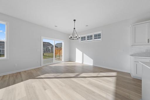 Representational Purpose Only. Dining Area- piano windows!