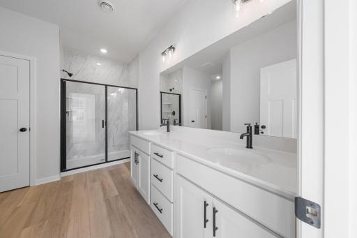 Representational Purpose Only. Dual Sink Vanity in Accessible Beige ( pictures do not reflect actual color) , upgraded faucets by Moen,