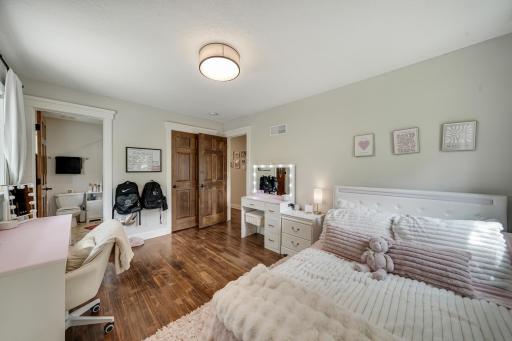 Second of four upstairs bedrooms! This bedroom suite contains a private en suite bathroom.