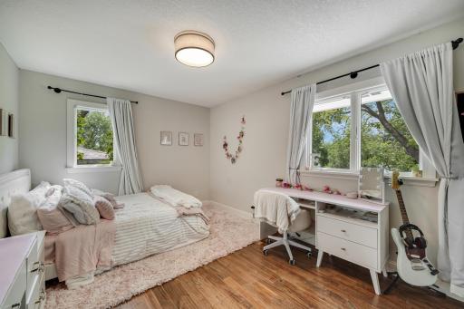 Second of four upstairs bedrooms! This bedroom suite contains a private en suite bathroom.