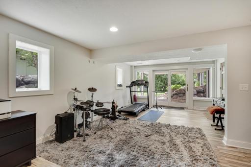 Versatile space in lower level; perfect for a pool table, workout space or game room!