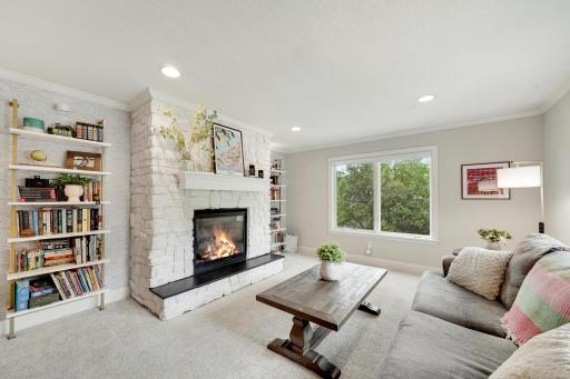 Four-season porch with gas burning fireplace.