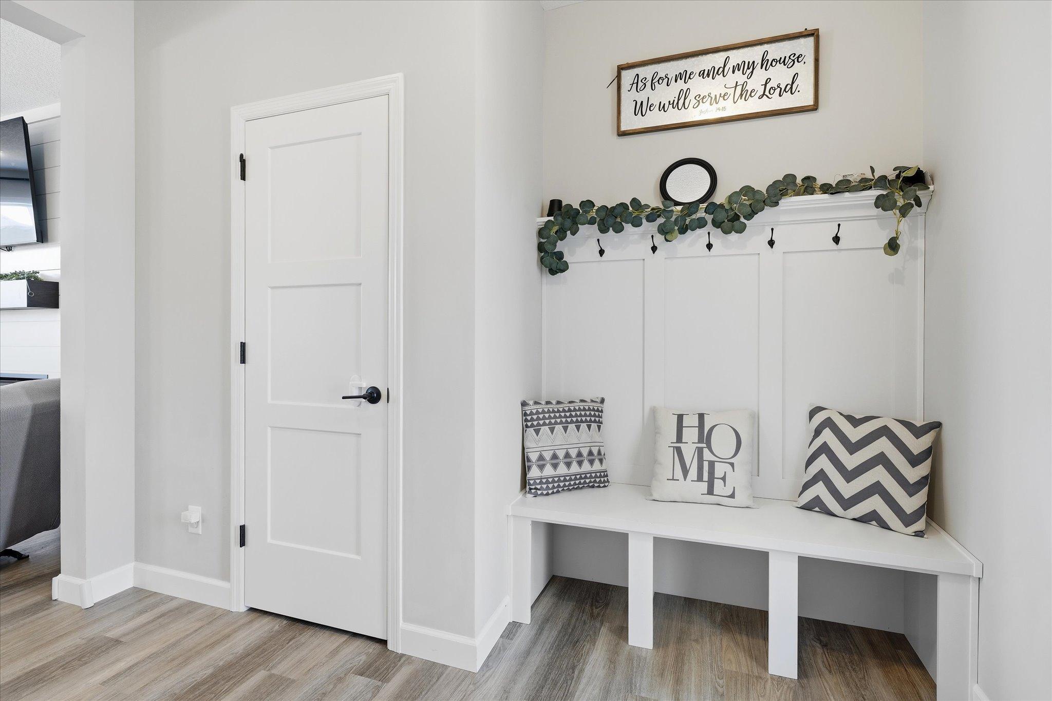 Set your guest's first impression as they enter your lovely foyer with bench, coat closet, and 1/2 bath.