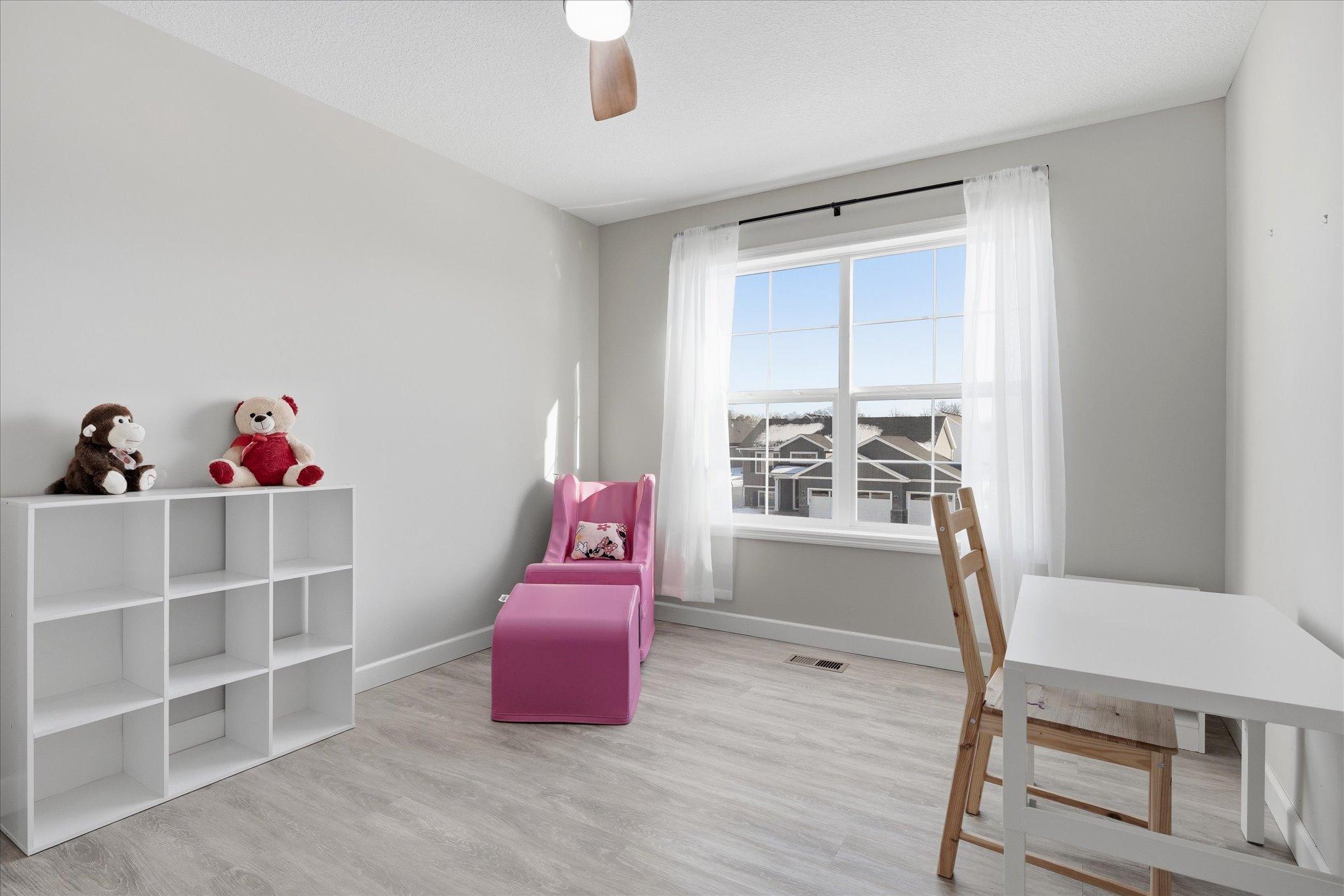 4 of the 5 bedrooms on upper level and all have new closet organizers. This bedroom has new LVP flooring
