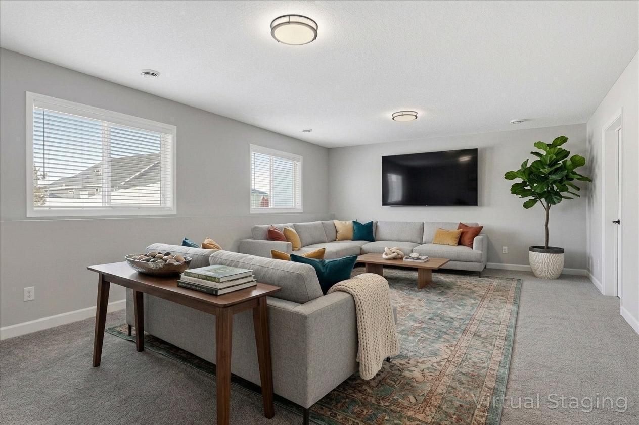 Virtually staged | Brand new (completed Feb 2026), professionally finished lower level offering family room (23x16 sqft), 5th bedroom and 4th bathroom!