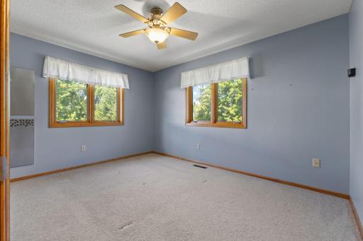 The upstairs primary features a large closet