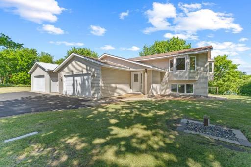 This 3 bed, 2 bathroom home features two parcels at a combined 9.32 acres, and falls within the Elk River School District boundaries.