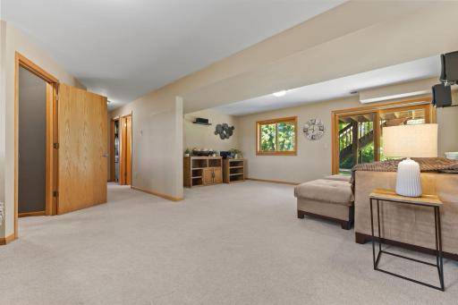 The far section of this room is ready to be used as a family room, complete with included overhead speakers.