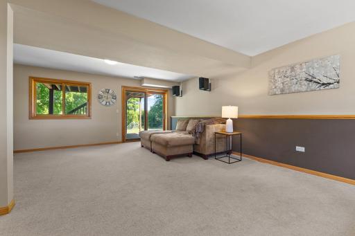 Downstairs, you'll find an oversized living area, that could be separated for two different uses.