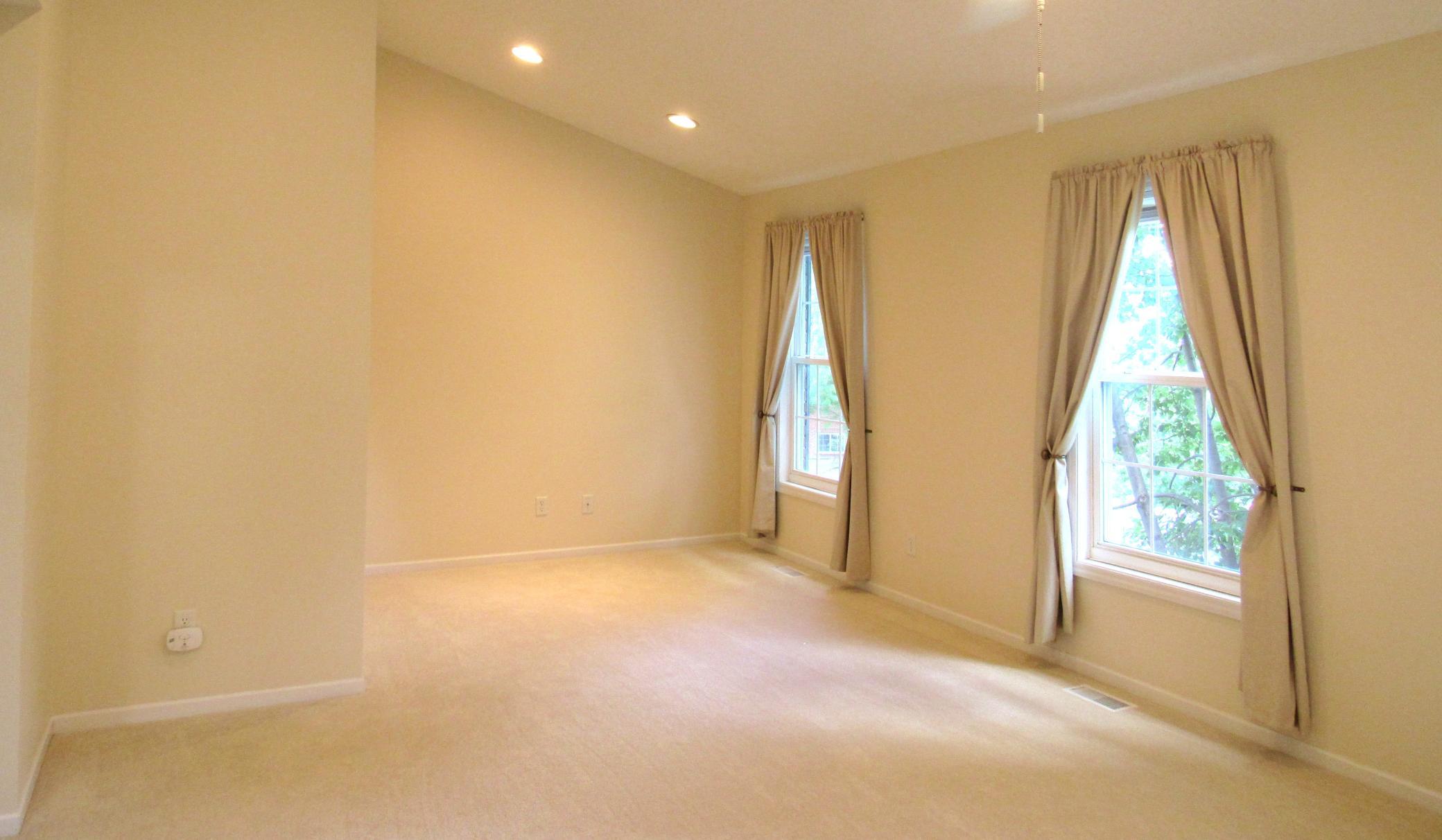 The massive primary bedroom is 23x13! Vaulted with recessed lighting and a light/fan combo.