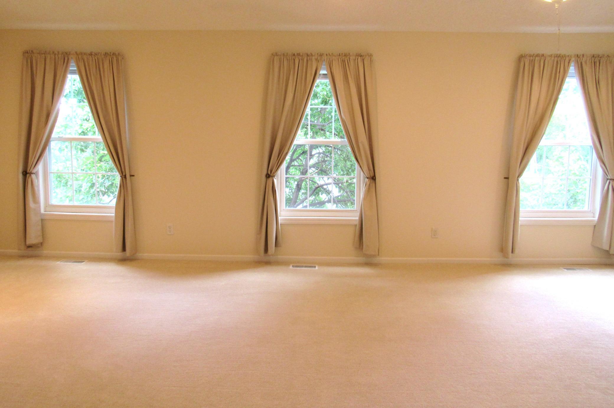 Wow the space is incredible! Fresh paint and new carpet.